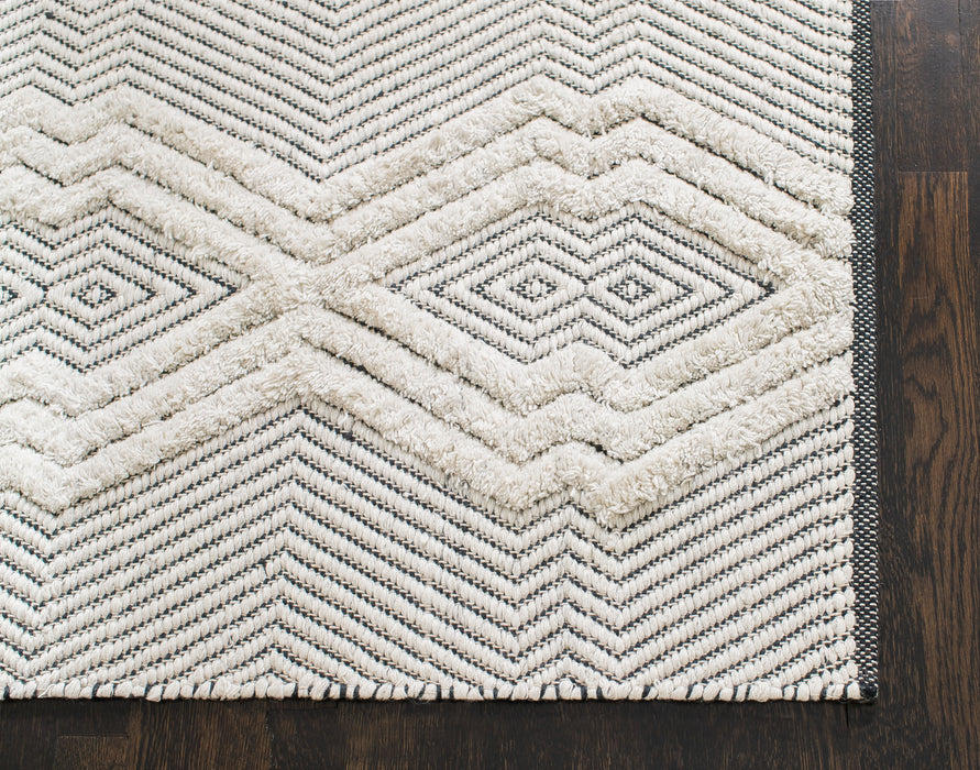 Anji Mountain Joni Tufted Tribal Area Rug