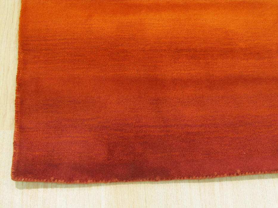 EORC Handmade Wool Orange Transitional Solid Horizon Rug