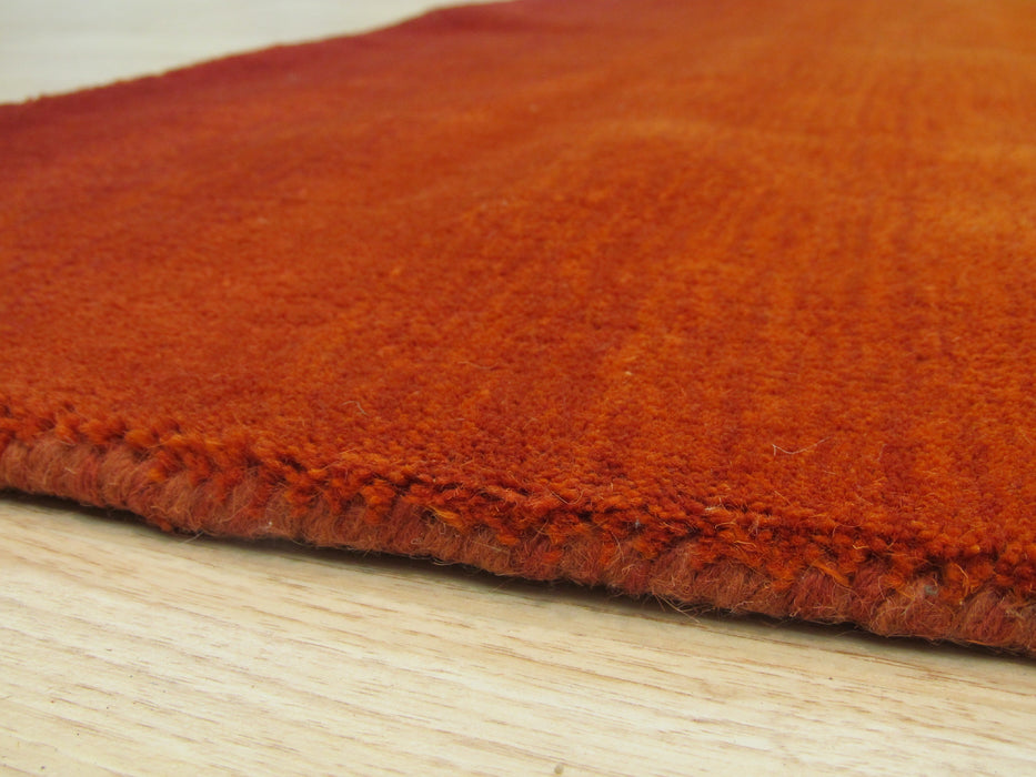 EORC Handmade Wool Orange Transitional Solid Horizon Rug