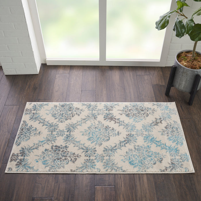 Nourison Tranquil TRA09 Ivory/Turquoise Area Rug